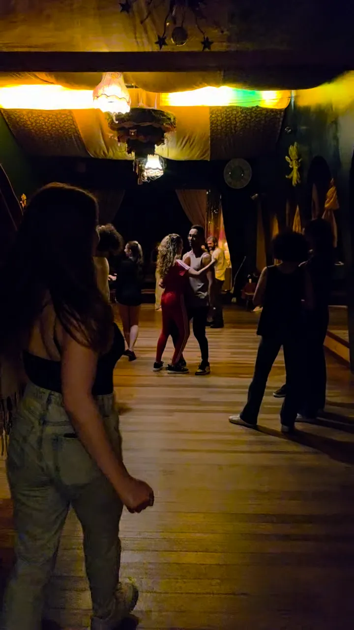 Couples dancing at an evening Zouk social